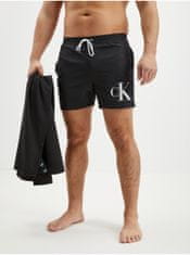 Calvin Klein Sada pánských plavek v černé barvě a ručníku Calvin Klein Underwear XXL