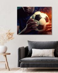 ZUTY Obrazy na stěnu - Fotbalový míč v rukou 40x50 cm vypnuté plátno na rám