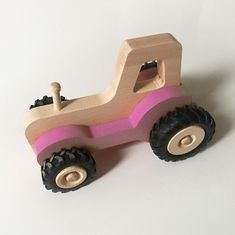Fraise et Bois Dřevěný traktor Serge - Růžový