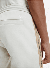 Calvin Klein Krémové pánské teplákové kraťasy Calvin Klein Jeans M