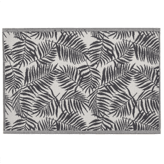Beliani Venkovní koberec 120 x 180 cm černé palmové listy KOTA