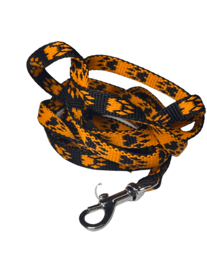 Palkar Vodítko z popruhu pro psy 150 cm x 10 mm černo-oranžová s tlapkami