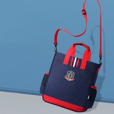 Klarion Retro červeno-modrá školní taška Remus do ruky nebo na rameno