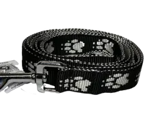 Palkar Vodítko přepínací z popruhu pro psy 250 cm x 25 mm černo-bílá s tlapkami