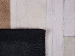 Beliani Černo-béžový kožený koberec 140x200 cm DALYAN