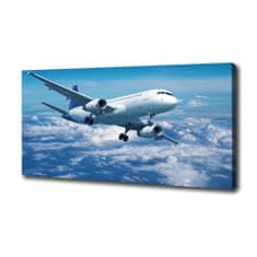 Wallmuralia Foto-obraz canvas do obýváku Letadlo v oblacích 100x50 cm