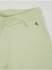 Calvin Klein Světle zelené holčičí tepláky Calvin Klein Jeans 140